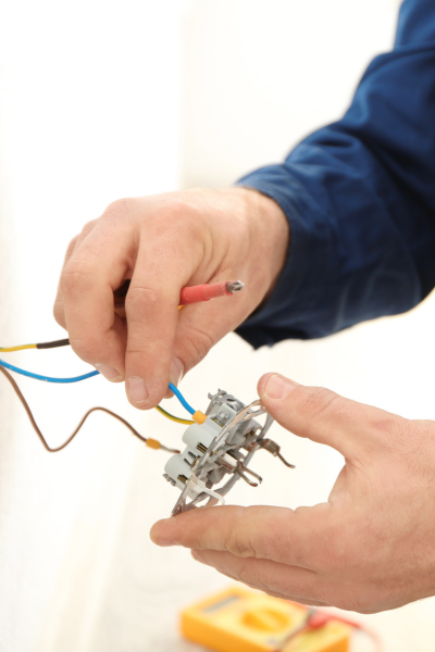 Electrician fixing wires